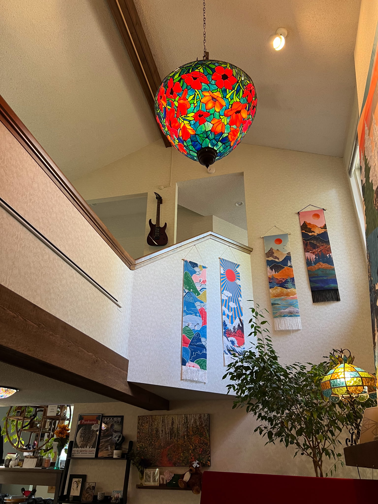 Colorful stained glass lamp hanging in artistic living space